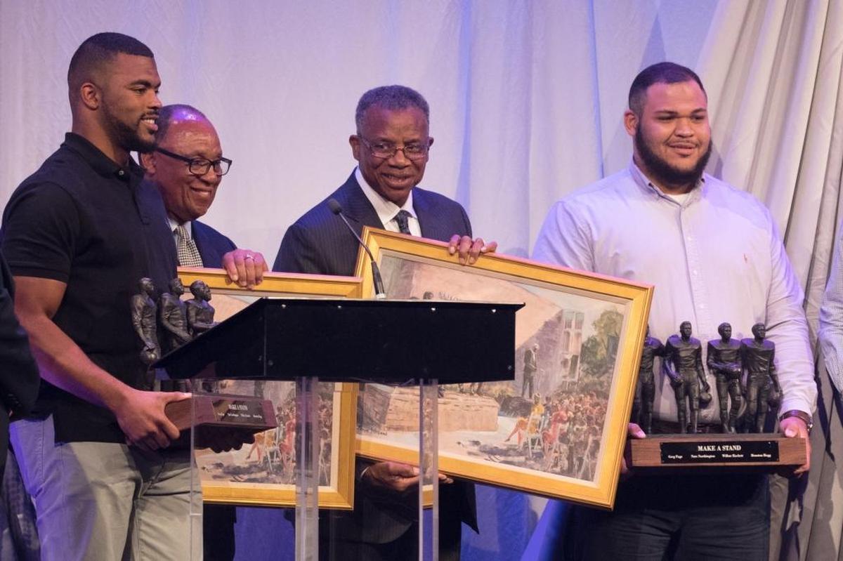 Wilbur Hackett and Nate Northington, two of Kentucky’s first black football players, were each presented a replica statue of the one placed at Kroger Field in their honor at the 2017 CATSPY Awards in Memorial Coliseum.