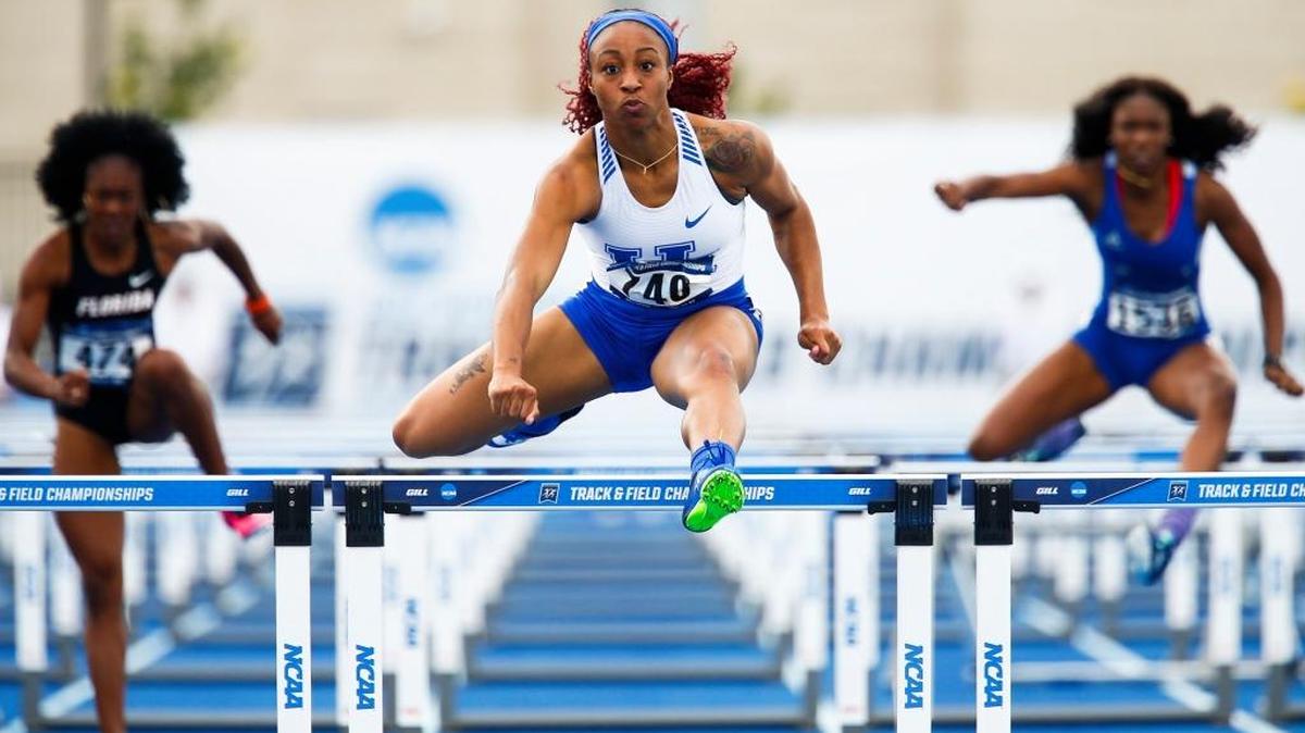 Kentucky's Jasmine Camacho-Quinn (740) clears the final hurdle to win the women's 100-meter hurdles during the NCAA Division I Outdoor Track and Field East Preliminary Championships at the University of Kentucky in Lexington, Ky., Friday, May 26, 2017. Camacho-Quinn finished with a time of 12.79.