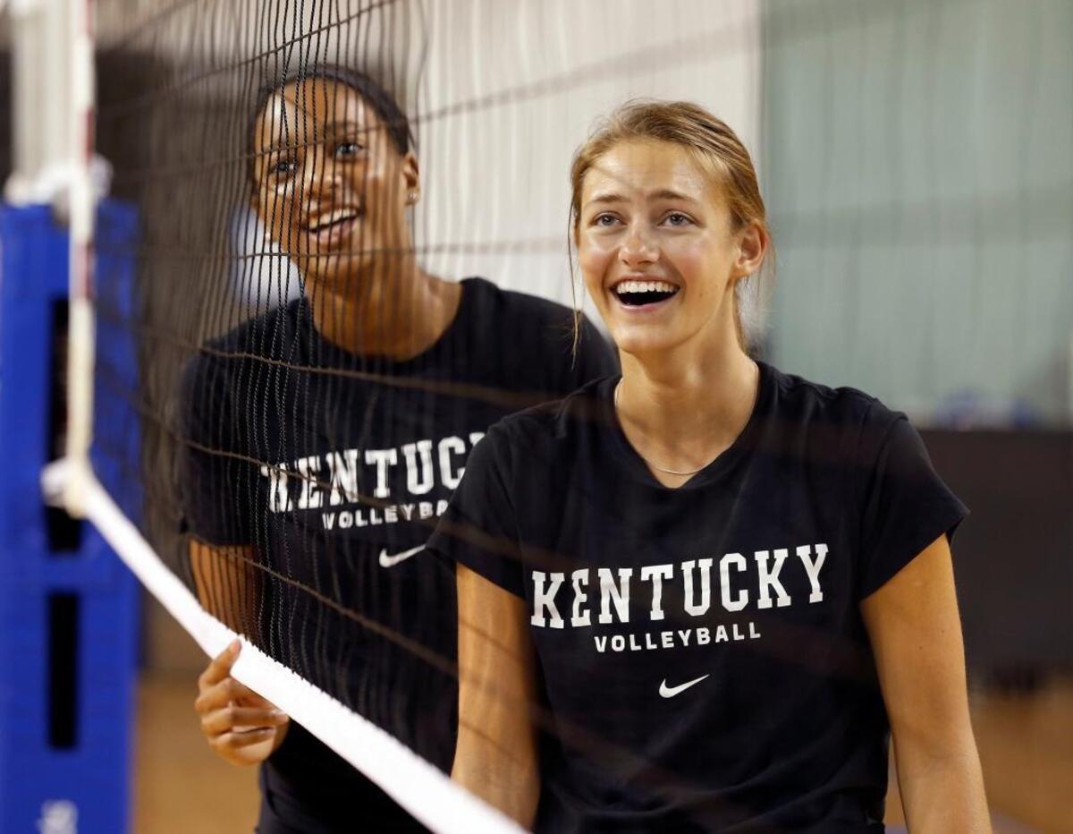 Leah Edmond, left and Madison Lilley, right, laughed during last year's UK volleyball media day in Memorial Coliseum. Both were named Thursday to the 2018 preseason All-SEC Team.