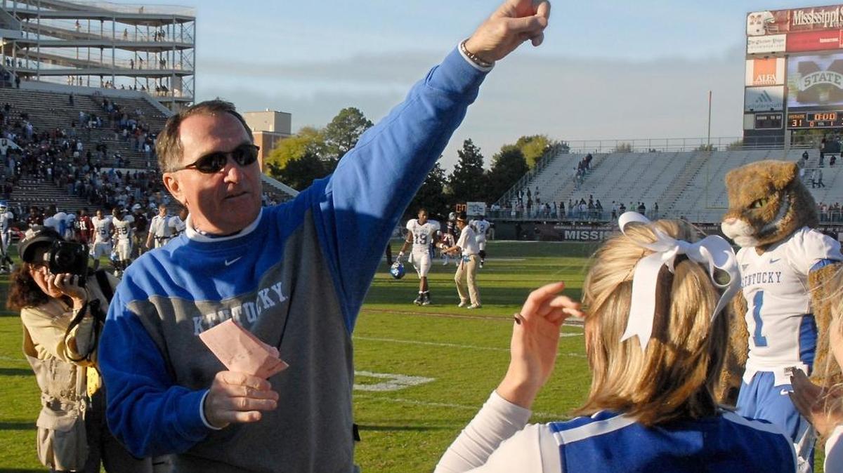 Rich Brooks signaled to Kentucky fans after a victory over Mississippi State in 2006.