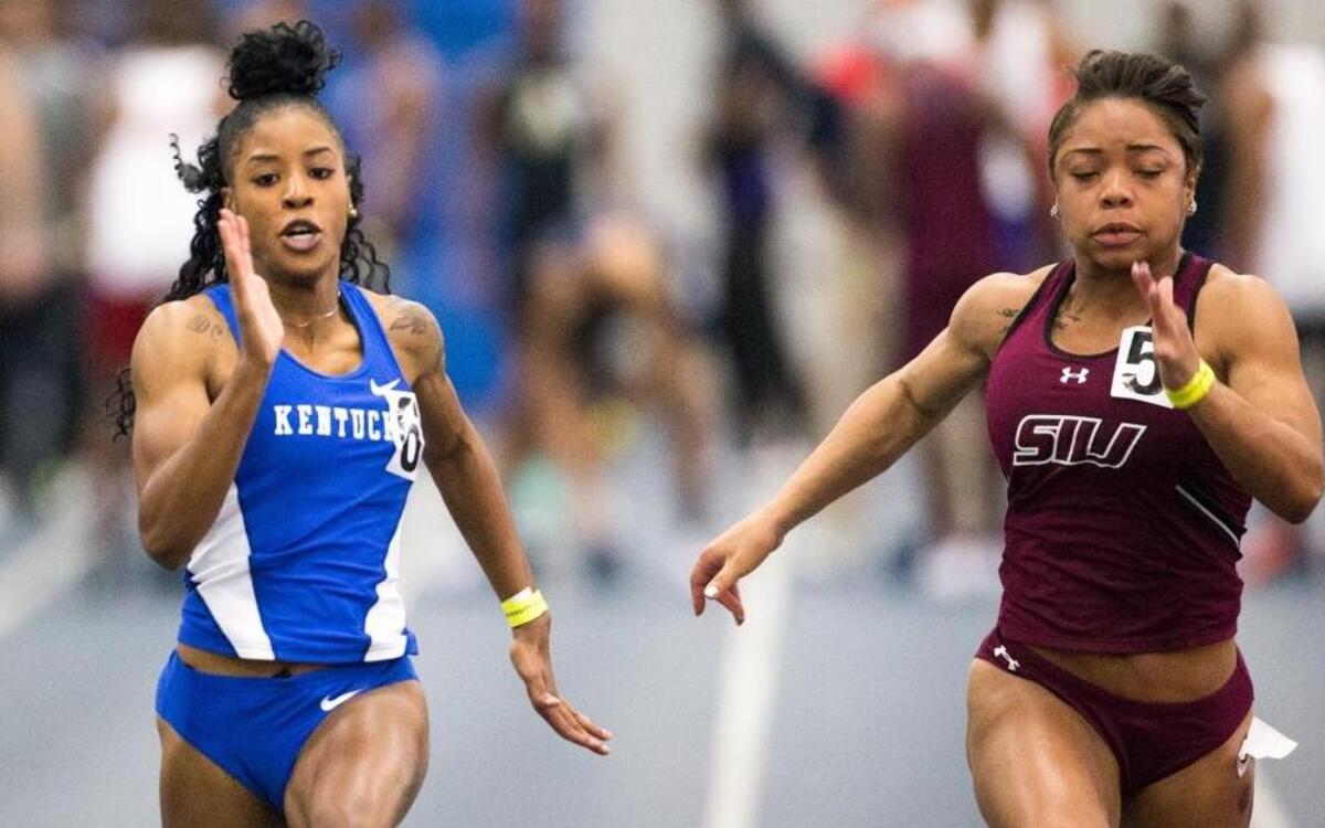 UK's Destiny Carter, left, won her heat with a 7.48 seconds in the 60m Dash as UK hosted the Kentucky Invitational Track and Field Meet at the Nutter Field House on Saturday Jan. 16, 2016 in Lexington, Ky.