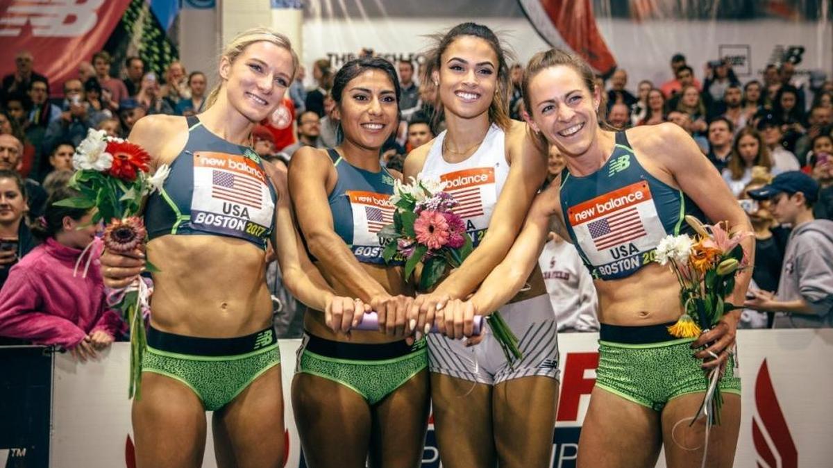 From left, Emma Coburn, Brenda Martinez, Sydney McLaughlin and Jenny Simpson posed with the baton after they set a distance medley relay world record Saturday.