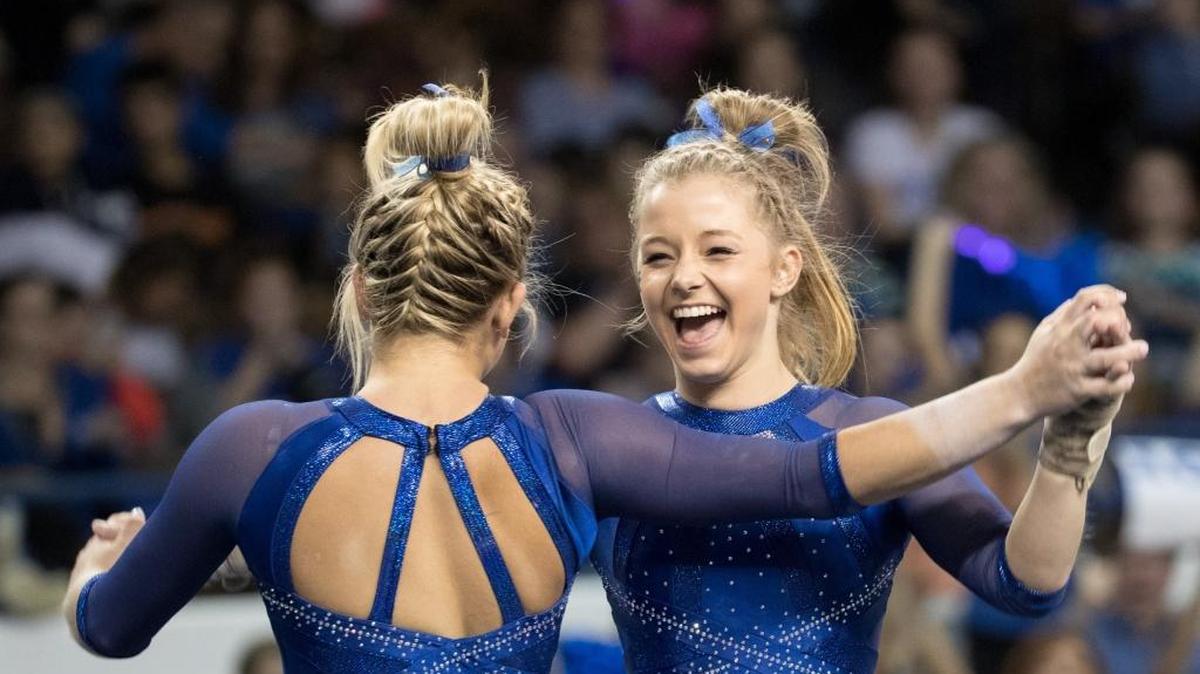 Kentucky freshman Mollie Korth, right, congratulated teammate Alex Hyland after the floor exercise during a match against Auburn at Memorial Coliseum on Jan. 20. Korth’s floor routine capped UK’s record night against Alabama on Friday.