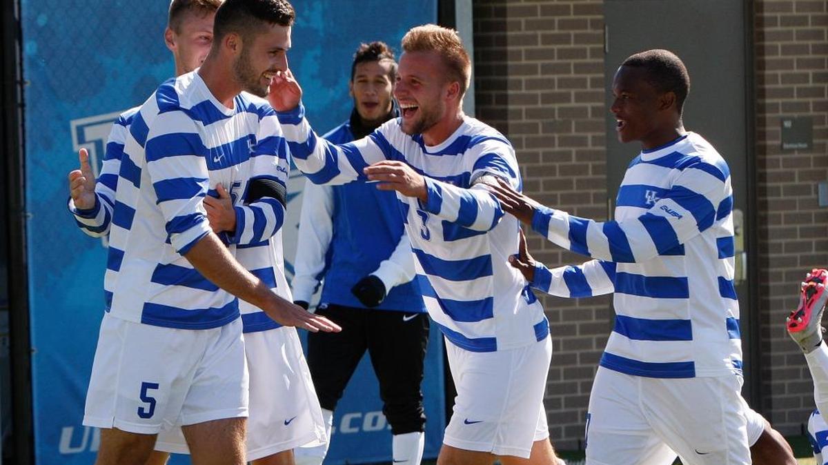UK players celebrate the goal by Jordan Wilson, left, against South Carolina at the Bell Soccer Complex at UK in Lexington, Ky., Sunday, October 18, 2015. UK defeated South Carolina 1-0.