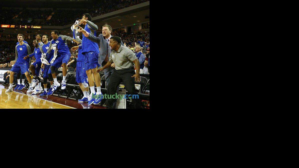 The Kentucky bench celebrated a dunk by Marcus Lee in the second half.