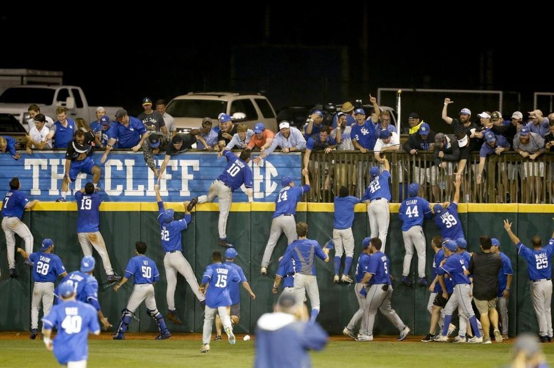 Kentucky players ran to the outfield wall to celebrate with fans early Tuesday morning after defeating North Carolina State in the NCAA regional final in Lexington.