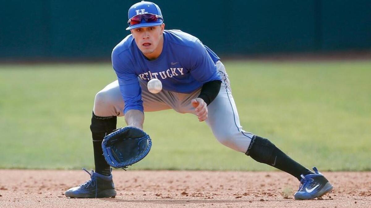 Kentucky infielder Evan White took ground balls during a UK practice last week.