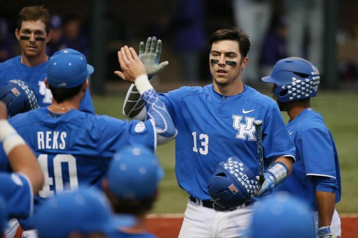 Kentucky catcher Kole Cottam wears No. 13 on his jersey to mark the 13 surgeries he underwent as a child in the area of his right eye to remove congenital melanocytic neves.