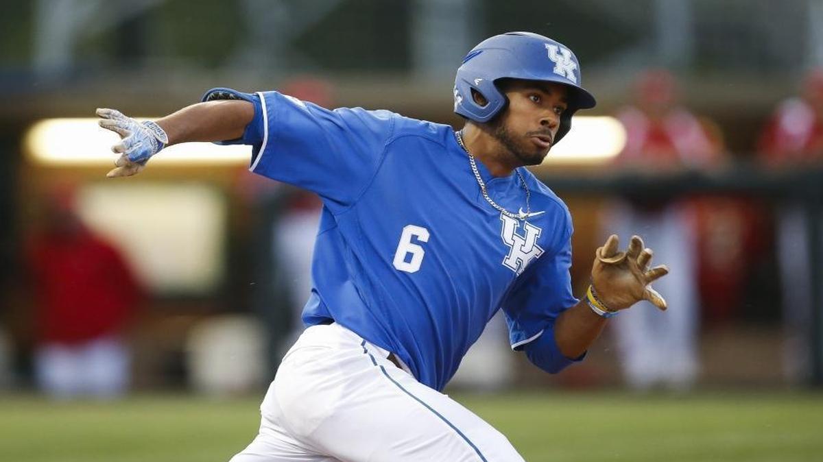 Kentucky outfielder Tristan Pompey rounded first base after hitting a double against Louisville on April 18.