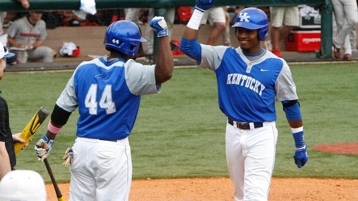 UK second baseman JaVon Shelby is congratulated by Dorian Hairston, left, following his home run in the fourth inning against Georgia at Cliff Hagan Stadium in Lexington, Ky., Sunday, May 10, 2015. Georgia prevailed 6-1 to win the series 2-1.