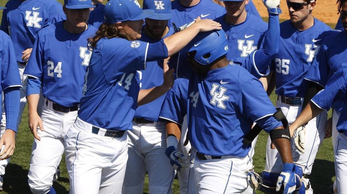 UK pitcher Dustin Beggs slaps Dorian Hairston’s helmet following his home run in the fourth inning against Florida at Cliff Hagan Stadium in Lexington on Saturday, March 26, 2016.