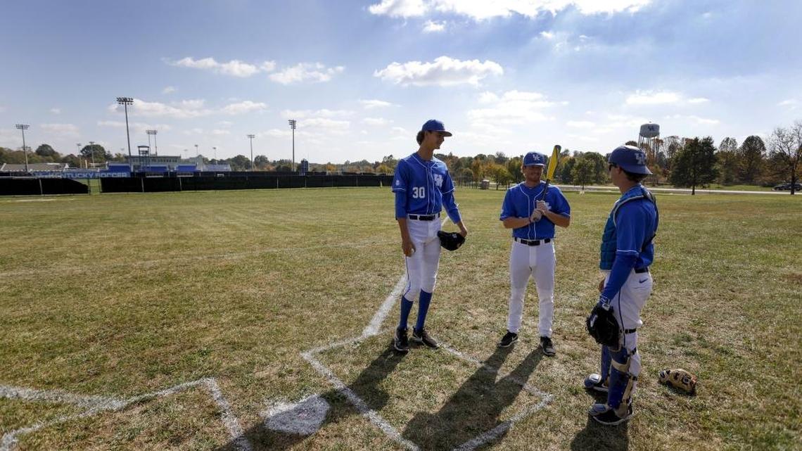 UK baseball players Sean Hjelle, left, Tyler Marshall, center, and Connor Heady were on site Monday at the location of the new UK baseball stadium, which is scheduled to be completed in fall 2018. Alumni Drive is the background, down the right-field line.