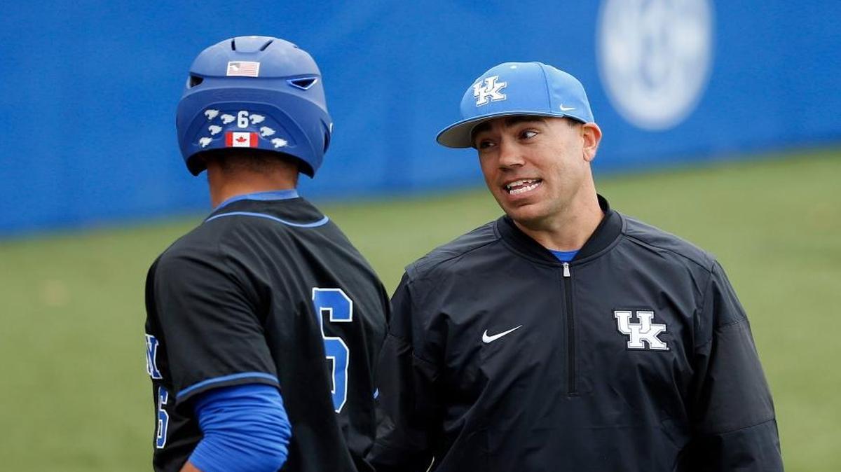 Kentucky baseball coach Nick Mingione, right, talked with outfielder Tristan Pompey before an at-bat against Eastern Kentucky this season. Mingione’s Cats will take on Mississippi State in Starkville, Miss., this weekend. He coached there the past eight seasons.