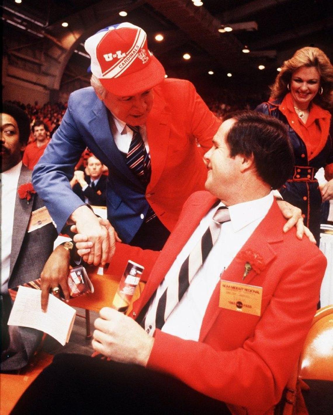Then-Kentucky Gov. John Y. Brown, decked out in a sport coat that was half Louisville red and half Kentucky blue, shook hands with U of L Coach Denny Crum before the Cardinals faced Joe B. Hall’s Kentucky Wildcats in the 1983 NCAA Tournament round of eight. Louisville would go on to win the “Dream Game” 80-68 in overtime.