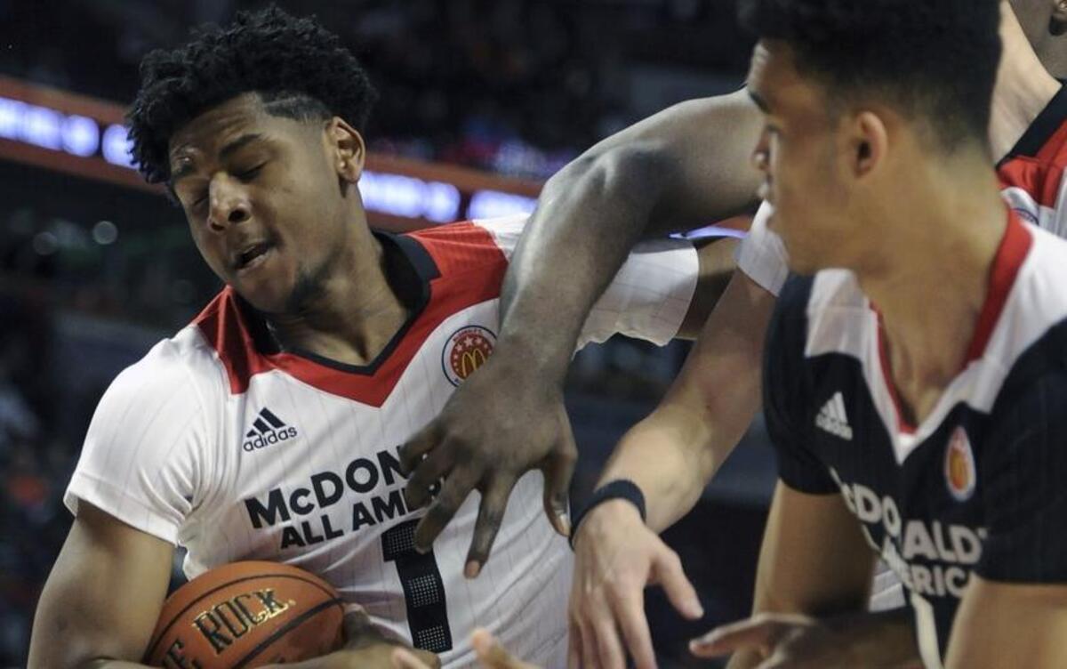 Marques Bolden, left, fought for a ball with Sacha Killeya-Jones during the McDonald's All-American last week in Chicago. Killeya-Jones has signed with Kentucky, while Bolden is still uncommitted.