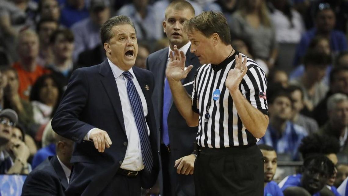 Kentucky Coach John Calipari argued a call with referee John Higgins in the first half of the South Regional finals game against North Carolina in the NCAA college basketball tournament in Memphis.