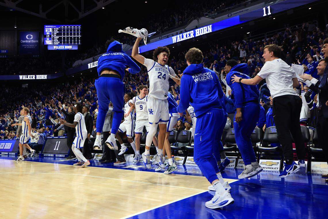 The Kentucky bench erupts in celebration after guard Walker Horn’s first-ever made field goal late in the second half of a blowout win over Tennessee Tech on Wednesday at Rupp Arena.