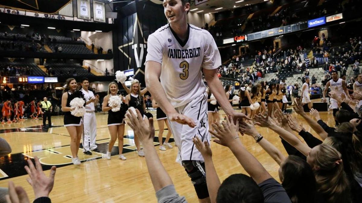 Vanderbilt forward Luke Kornet (3) celebrates with fans after defeating Auburn in an NCAA college basketball game Tuesday, Jan. 12, 2016, in Nashville, Tenn. Kornet had 11 points, 11 rebounds and 10 blocked shots as Vanderbilt won 75-57.