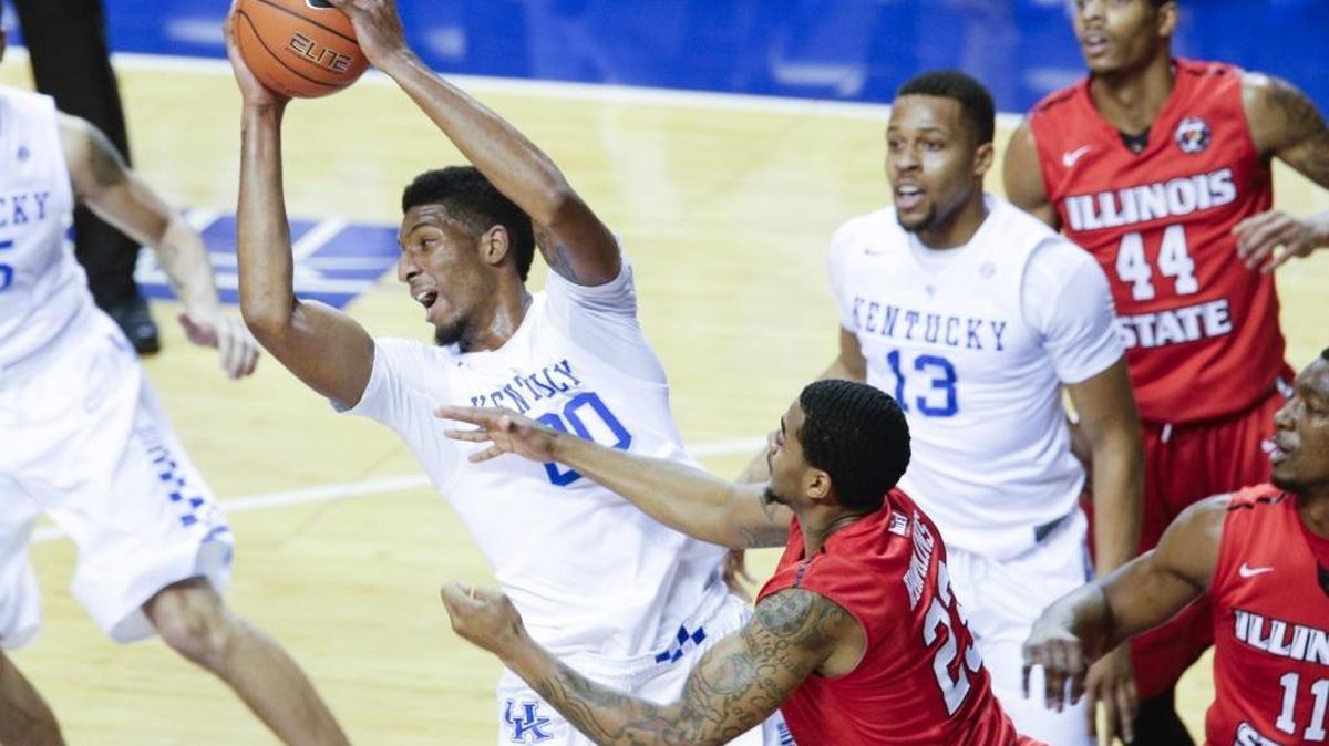 Kentucky forward Marcus Lee pulled down a rebound as the No. 1 Cats beat Illinois State on Monday. Lee had 13 points and a career-high 12 rebounds in the 75-63 win.