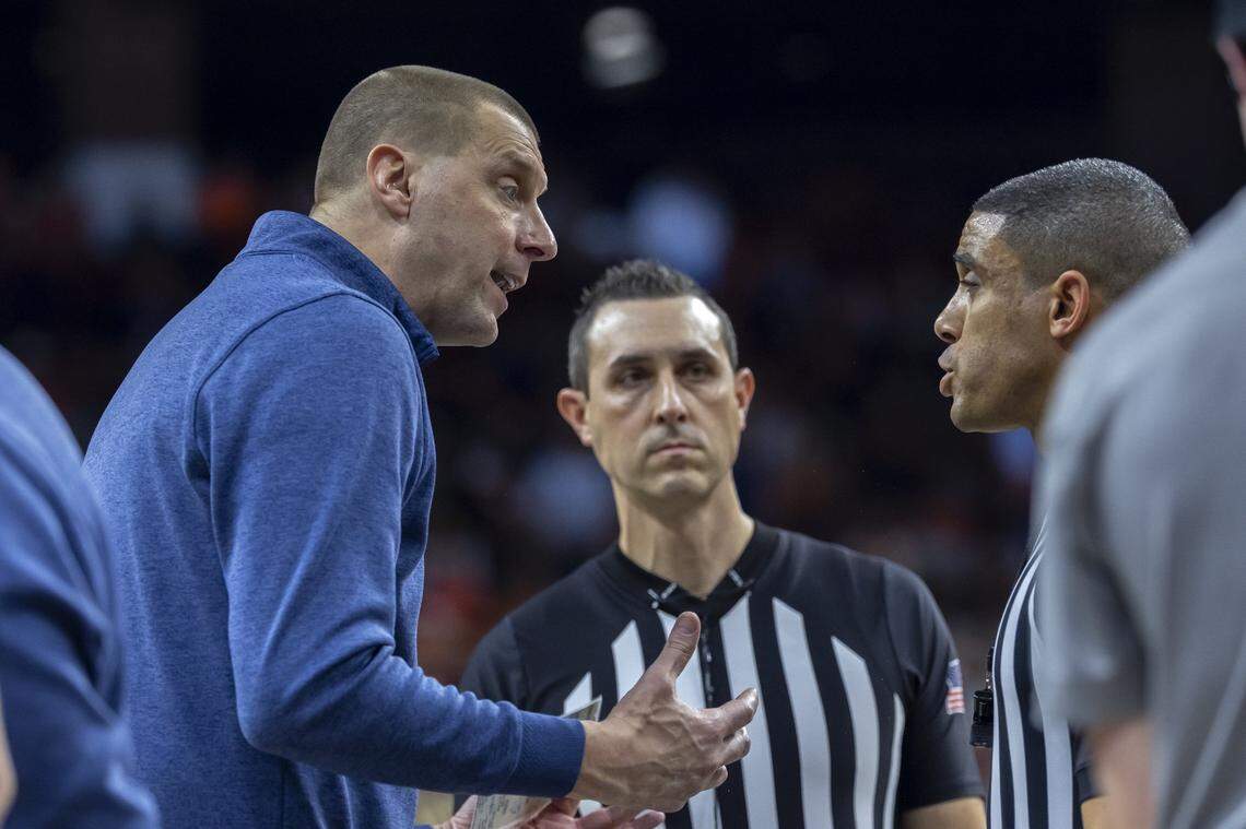 Kentucky basketball head coach Mark Pope speaks with an official during a game against Auburn at Neville Arena in Auburn, Alabama., on Saturday, Feb. 21, 2026. 