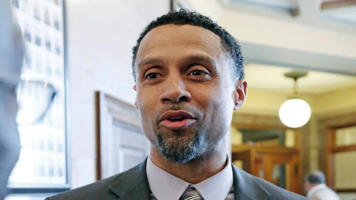 Former NBA basketball player Mahmoud Abdul-Rauf, a native of Gulfport, Miss., held a document from the Mississippi House with a resolution recognizing his athletic endeavors on Feb. 26, 2013, at the state Capitol in Jackson, Miss.