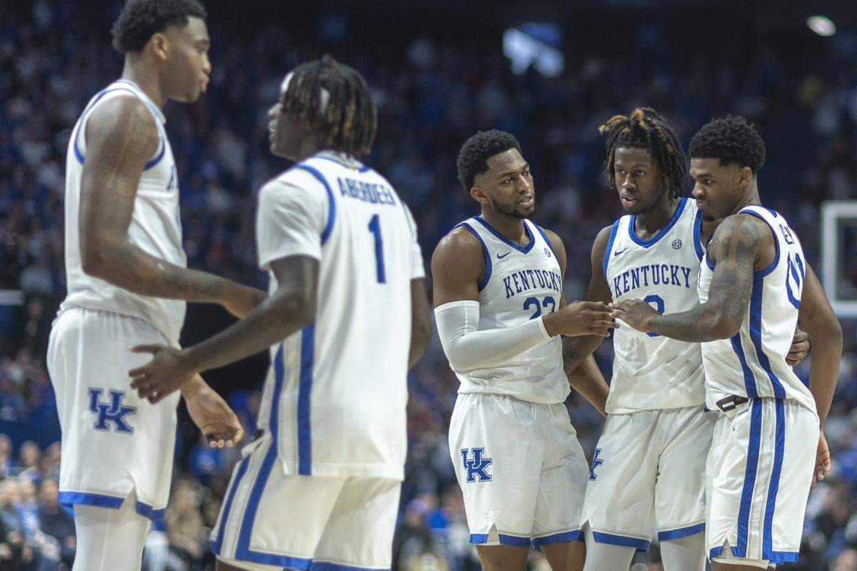 Kentucky players, from left, Brandon Garrison, Denzel Aberdeen, Mouhamed Dioubate, Kam Williams and Otega Oweh talk during a game against the Indiana Hoosiers at Rupp Arena on Saturday night.