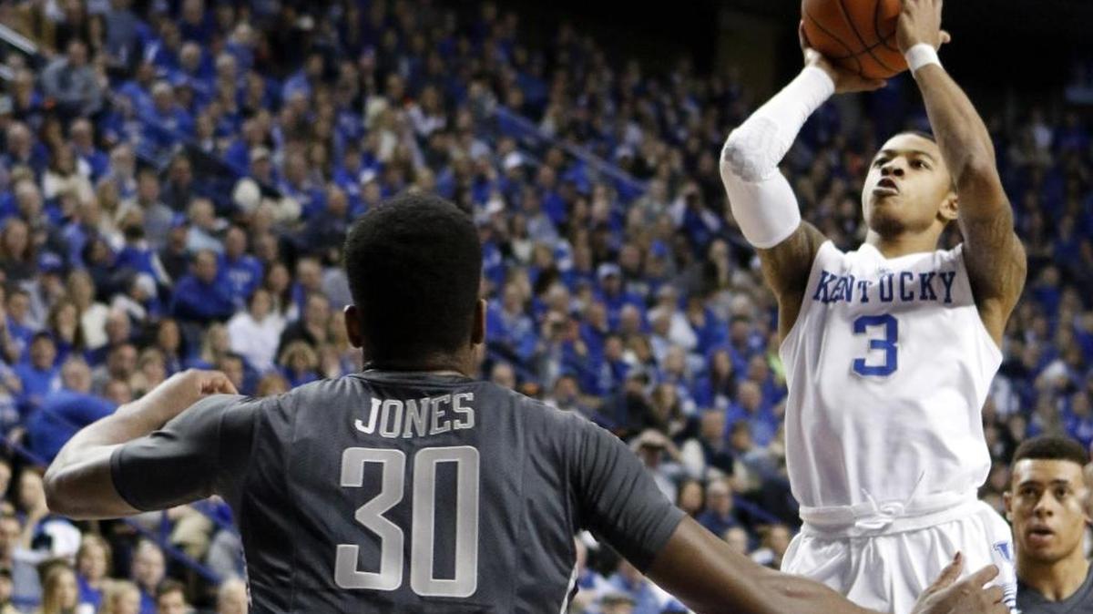 Kentucky's Tyler Ulis (3) shoots in front of Vanderbilt's Damian Jones (30) during the second half of an NCAA college basketball game Saturday, Jan. 23, 2016, in Lexington, Ky. Kentucky won 76-57.