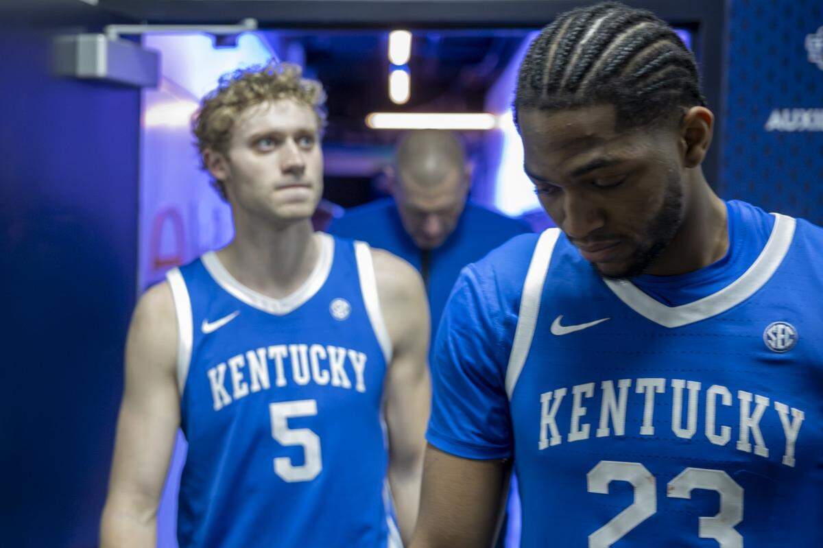 Kentucky Wildcats guard Collin Chandler (5), forward Mouhamed Dioubate (23) and coach Mark Pope leave their locker room following a victory against the Missouri Tigers during the SEC Tournament at Bridgestone Arena on Thursday.