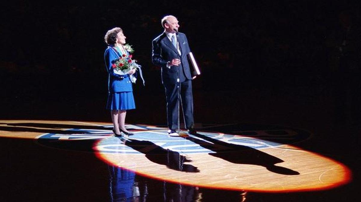 Cawood Ledford, the longtime “Voice of the Wildcats” took his place in the spotlight at midcourt along with his wife, Frances, on March 7, 1992, during a tribute after he called his last game in Rupp Arena.