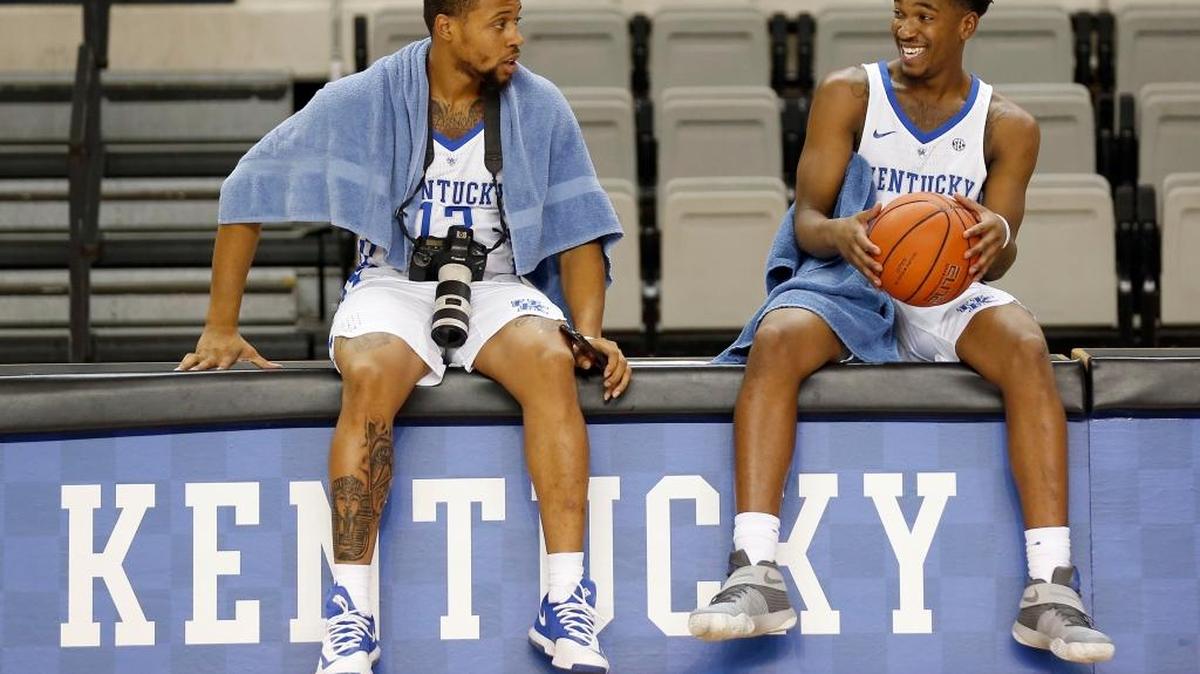 Kentucky Wildcats guard Isaiah Briscoe (13) and Kentucky Wildcats guard Malik Monk (5) shared a laugh during the University of Kentucky's men's basketball photo day held in Memorial Coliseum in Lexington, Ky., Thursday, September 15, 2016. Briscoe had borrowed a camera from a photographer to take his own photos.