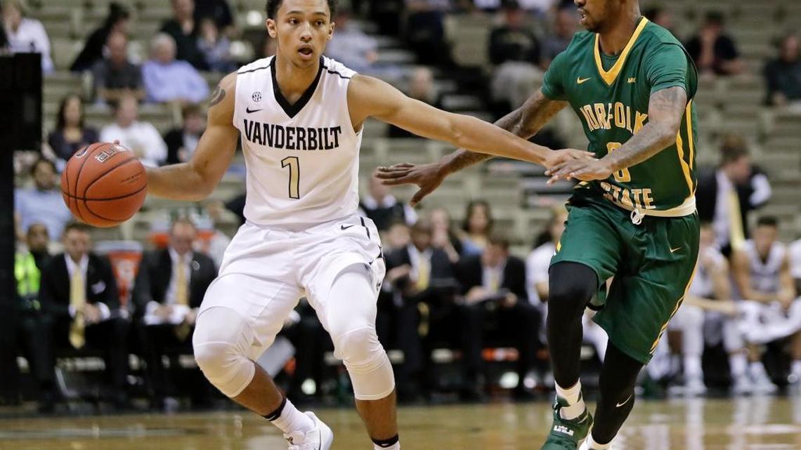 Host Vanderbilt’s Payton Willis (1) was pressured by Norfolk State’s Carrington Ward on Nov. 18. The Commodores, like many SEC teams, suffer from empty seats as a result of flagging attendance.