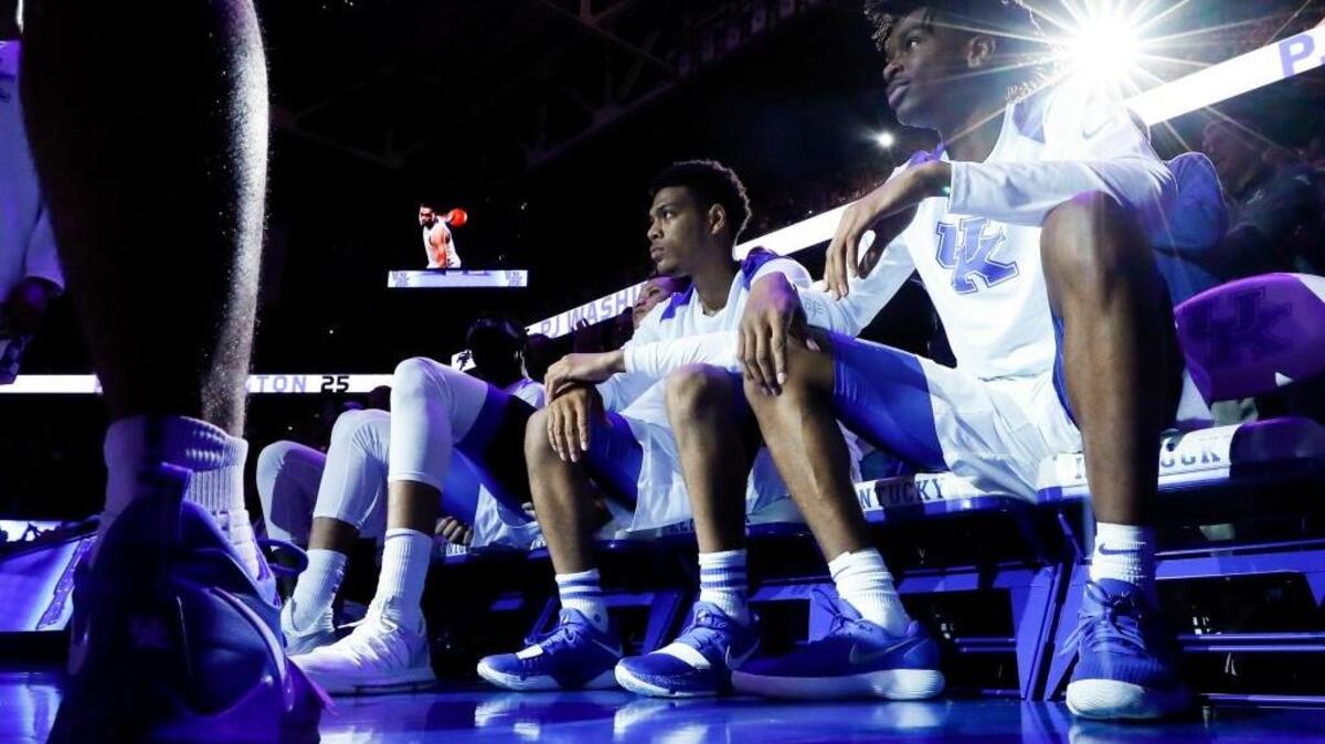 Kentucky’s Quade Green (0) and Shai Gilgeous-Alexander (22) wait on the bench during player intros before their exhibition game against the Centre Colonels at Rupp Arena on Nov. 3. The Cats open the season Friday at home against Utah Valley.