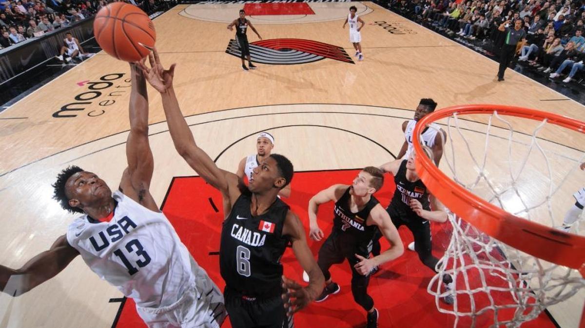 Jarred Vanderbilt, left, went up for a rebound with RJ Barrett in Friday night’s Nike Hoop Summit game.