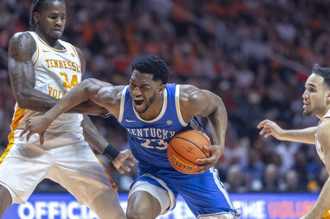 Kentucky Wildcats forward Mouhamed Dioubate (23) drives to the basket past Tennessee Volunteers center Felix Okpara (34)  during a game at Thompson-Boling Arena in Knoxville, Tennessee., on Saturday.
