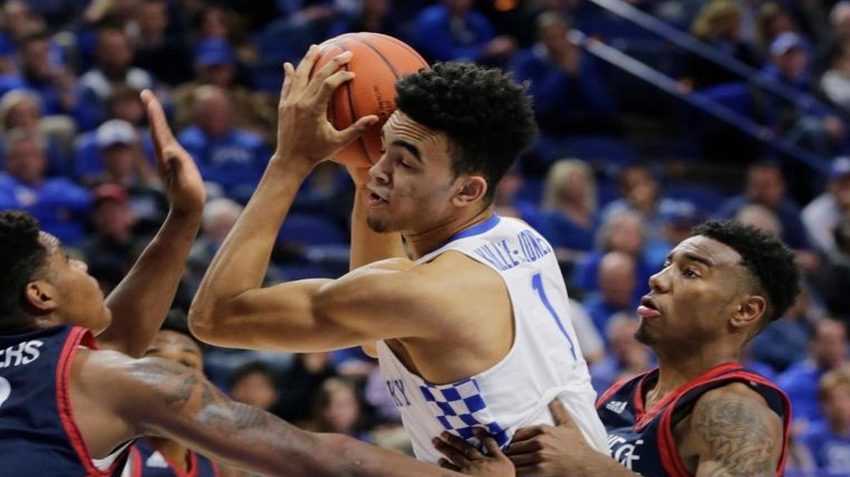 Kentucky's Sacha Killeya-Jones (1) was double guarded in the second half of the Duquesne at Kentucky mens basketball game at Rupp Arena in Lexington, Ky., on Nov. 20, 2016. Kentucky beat Duquesne 93-59.