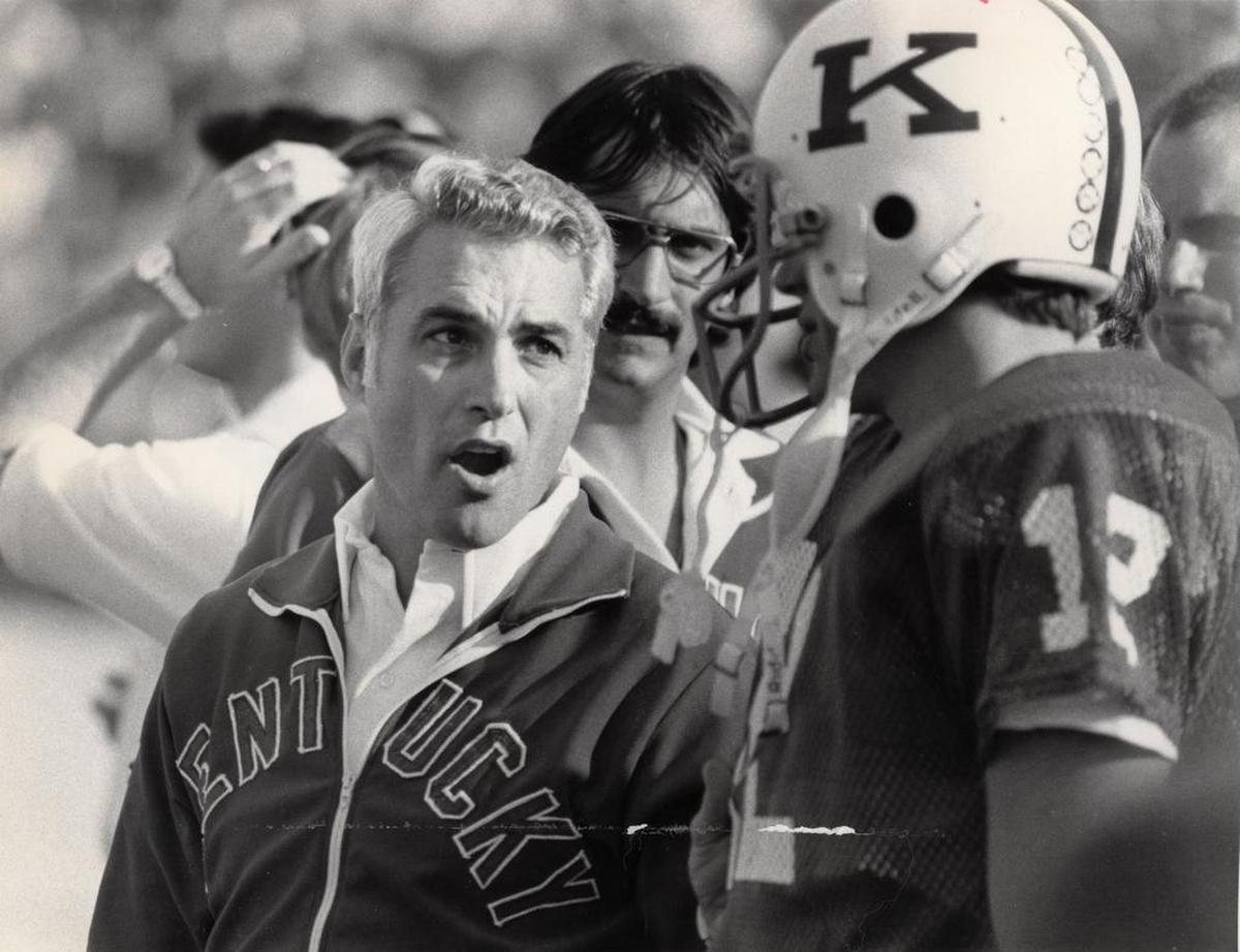 Former Kentucky coach Fran Curci, left, lost track of ex-UK quarterback Juan Portela (not pictured) after his playing days. “He just went to Miami and disappeared,” Curci says. “For years, I didn’t know where he was, what he had been doing.”