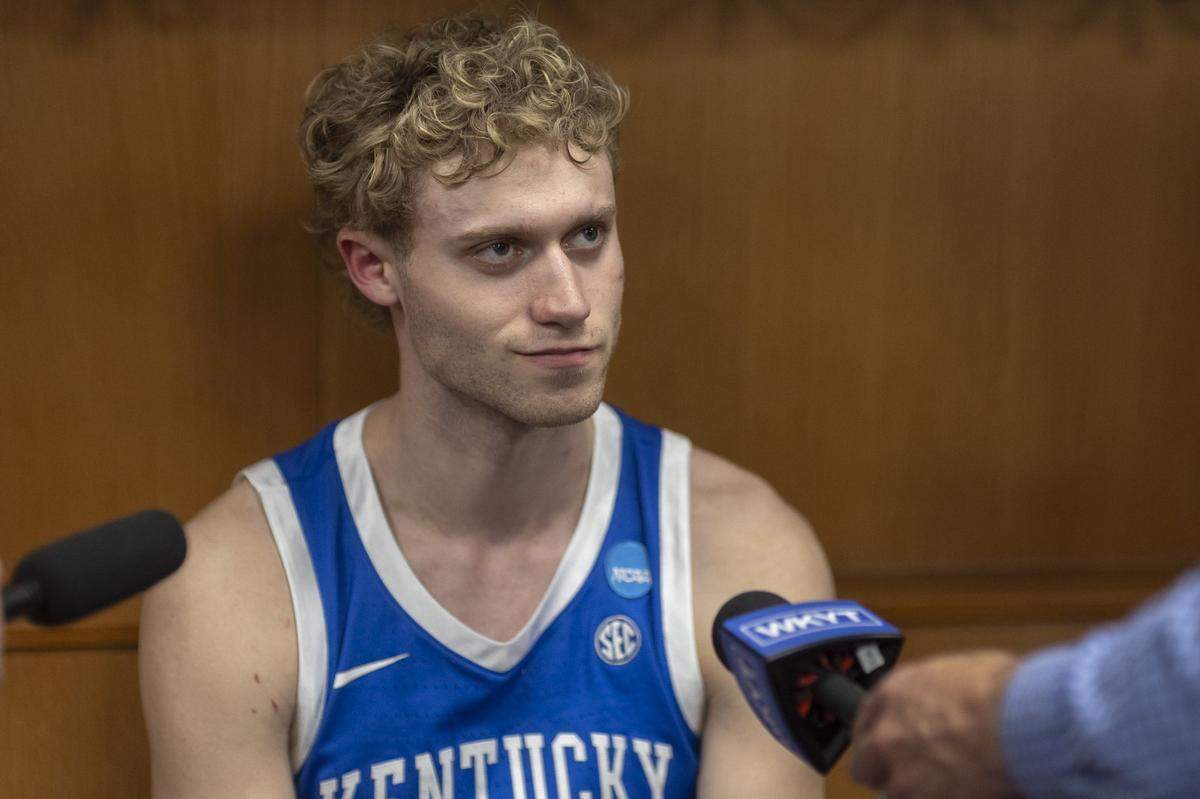 Kentucky Wildcats guard Collin Chandler (5) talks to members of the media following a loss to Iowa State during the second round of the NCAA Tournament at Enterprise Center in St. Louis, Mo., on Sunda,y March 22, 2026.