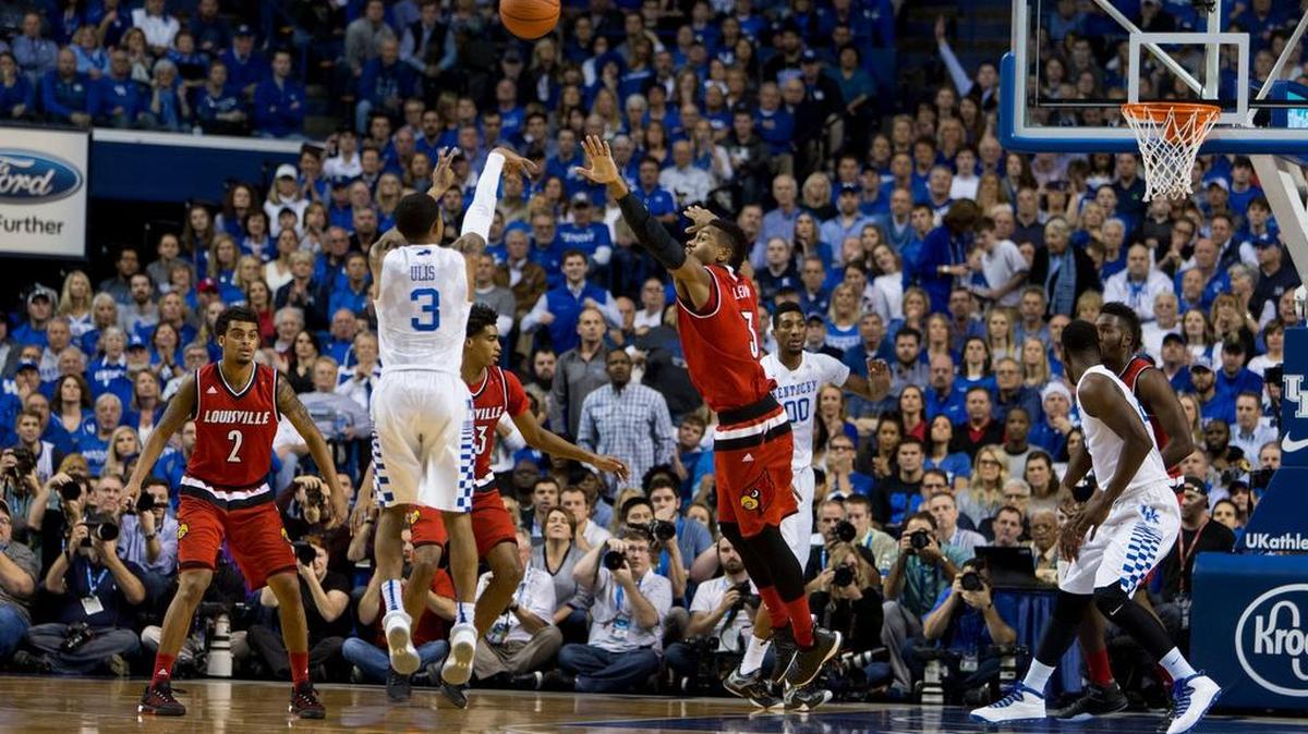 Kentucky guard Tyler Ulis, center, shot a three-point basket in the first half. The University of Kentucky hosted the University of Louisville, Saturday, Dec. 26, 2015, at Rupp Arena in Lexington.