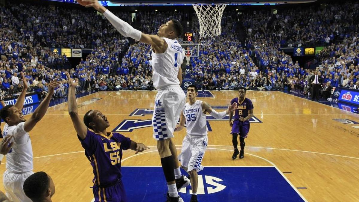 Kentucky forward Skal Labissiere (1) blocked a shot by LSU guard Tim Quarterman (55) in the first half of the LSU at Kentucky men's basketball game at Rupp Arena in Lexington, Ky, on March 5, 2016. Kentucky won 94-77.