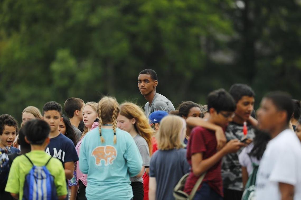 Emoni Bates talks with classmates at his middle school in Ann Arbor, Mich., Friday, June 16, 2017. Bates, 6-foot-7, is ranked the No. 1 rated seventh-grader in the nation by one recruiting website. One of his highlight reels on YouTube has been viewed about 1 million times.