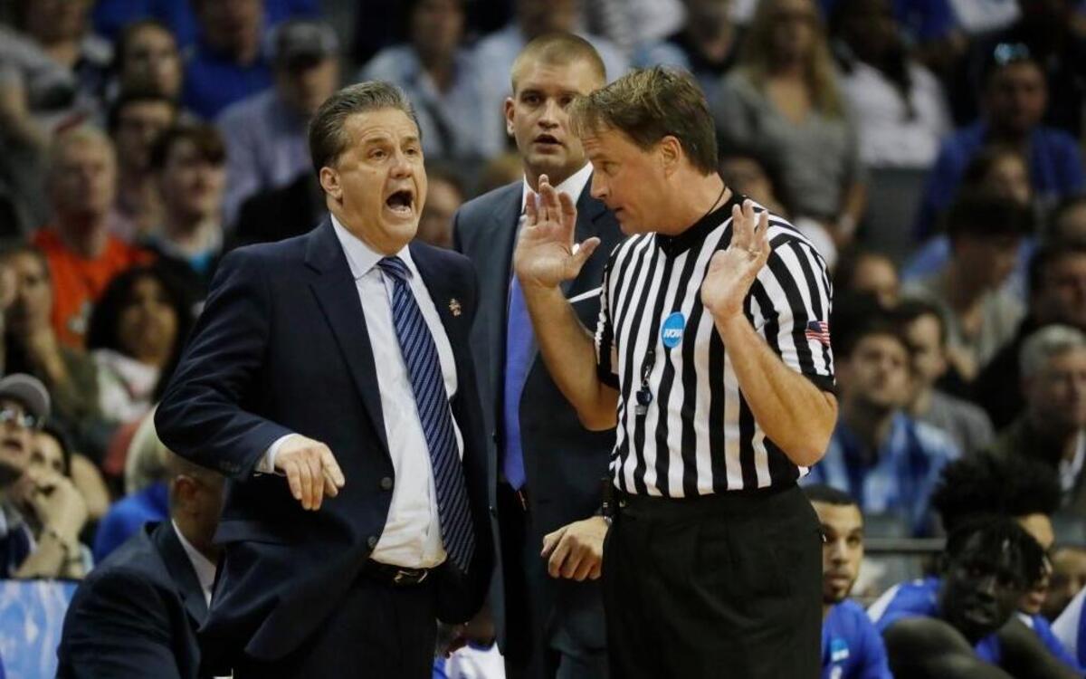 UK Coach John Calipari argued a call with referee John Higgins during the loss to North Carolina last weekend. Higgins said he received death threats from irate UK fans after the game.