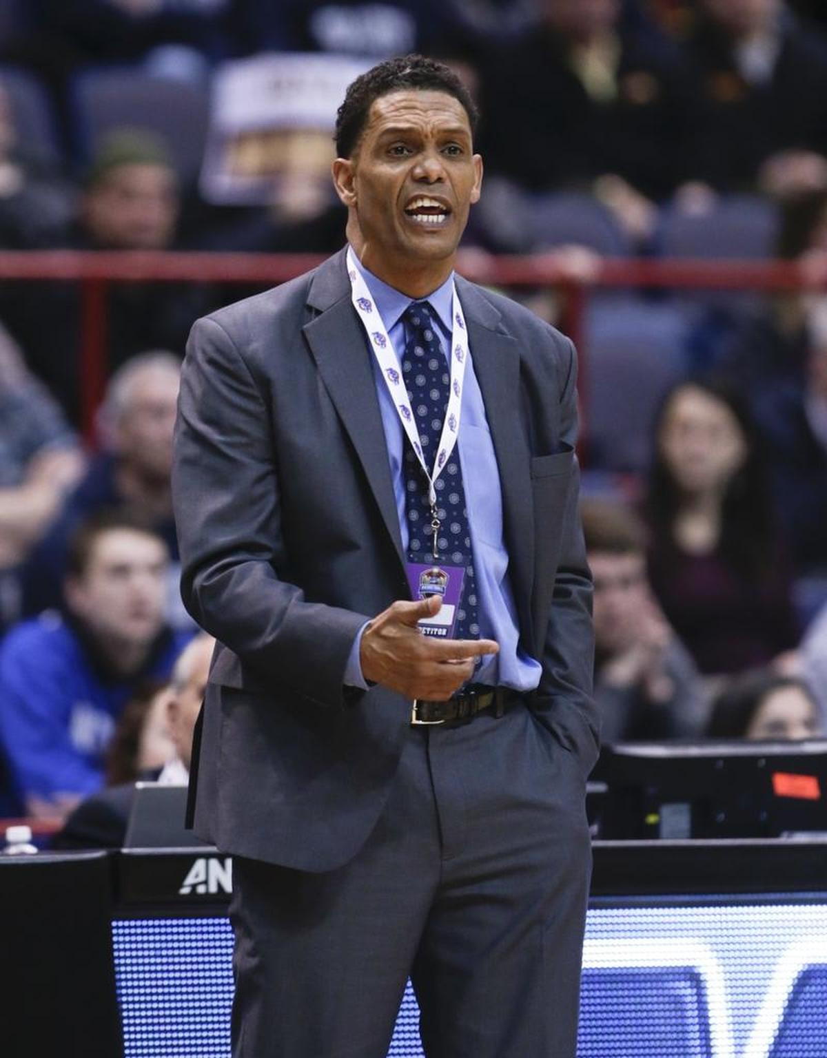 King Rice, a former point guard for North Carolina, is the head coach at Monmouth.