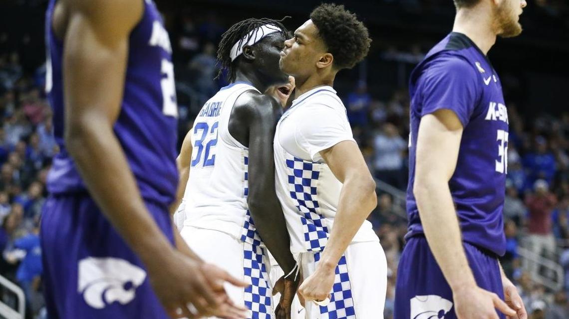 Kentucky’s Wenyen Gabriel (32) and PJ Washington celebrated during the first half of the Cats’ NCAA Tournament game against Kansas State in Atlanta on Thursday night.