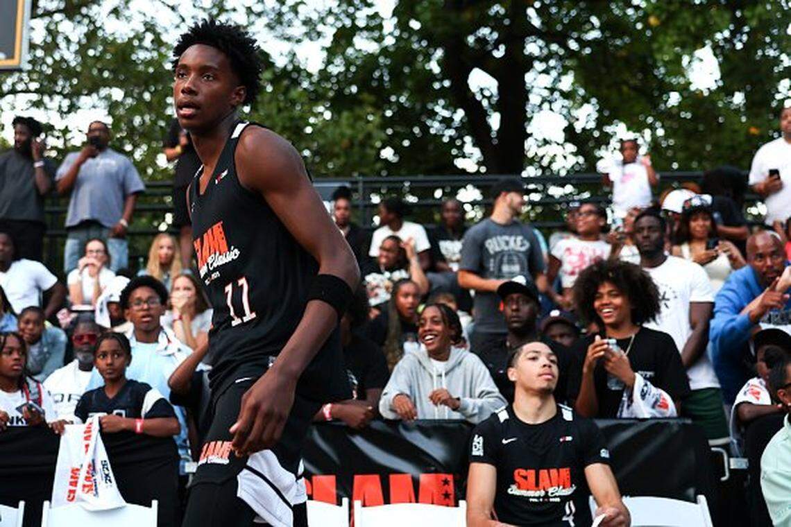 Class of 2026 recruit Christian Collins walks onto the court during the SLAM Summer Classic at Rucker Park on Aug. 18, 2025, in New York City. 