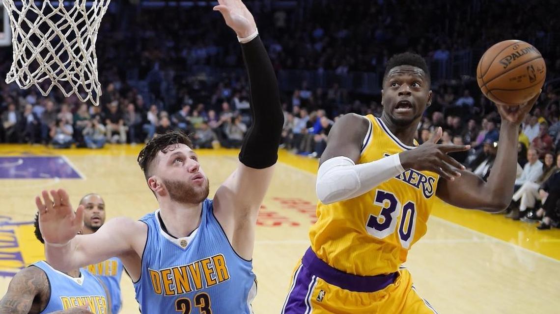 Julius Randle, right, is averaging 12.8 points and 8.1 rebounds for the Los Angeles Lakers this season.