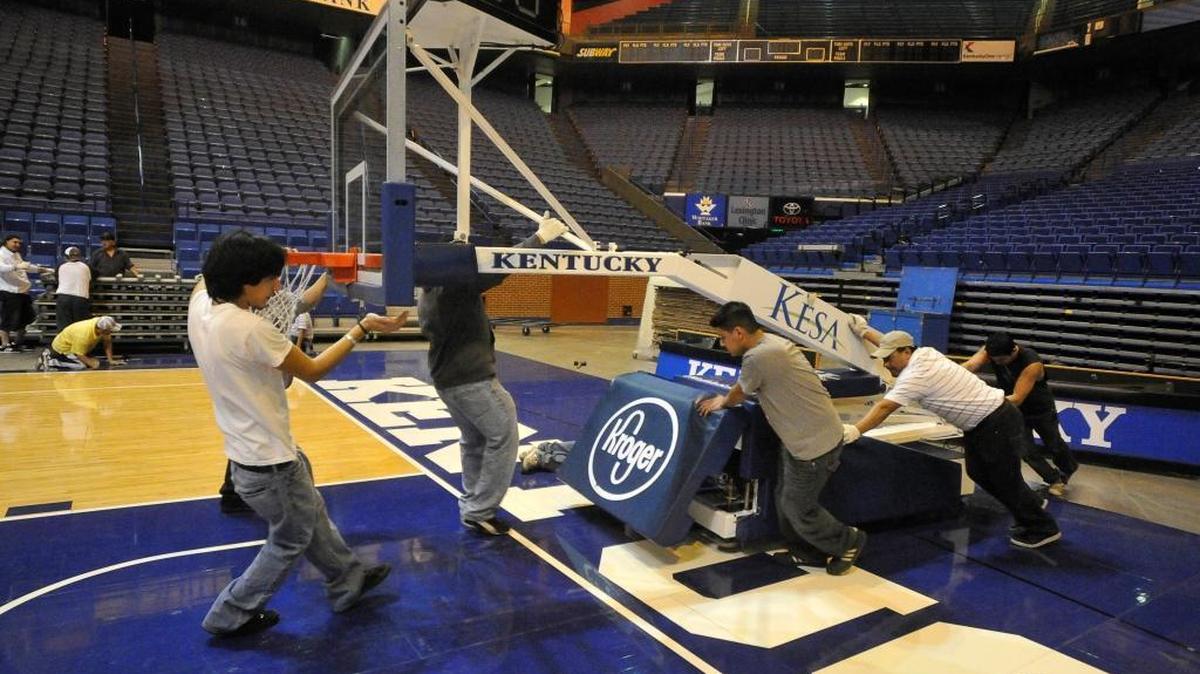 One of the old Rupp Arena basketball goals was moved backed into position on the floor as crew members prepared the arena for a game in 2013. Bigger than a car, the Lexington Center found out there was not much demand for Rupp’s old goals at auction, but it did find a buyer who purchased the set of three (two main, one backup) for $6,100.