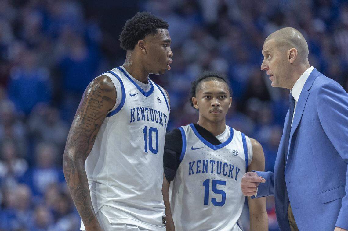 Kentucky Wildcats head coach Mark Pope talks to forward Brandon Garrison (10) and guard Jaland Lowe (15) during UK’s win over Indiana on Saturday at Rupp Arena 
