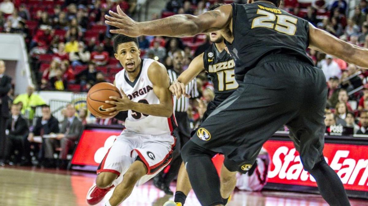 Georgia guard J.J. Frazier (30) and Missouri forward Russell Woods (25) squared off during their game in Athens, Ga., last month.