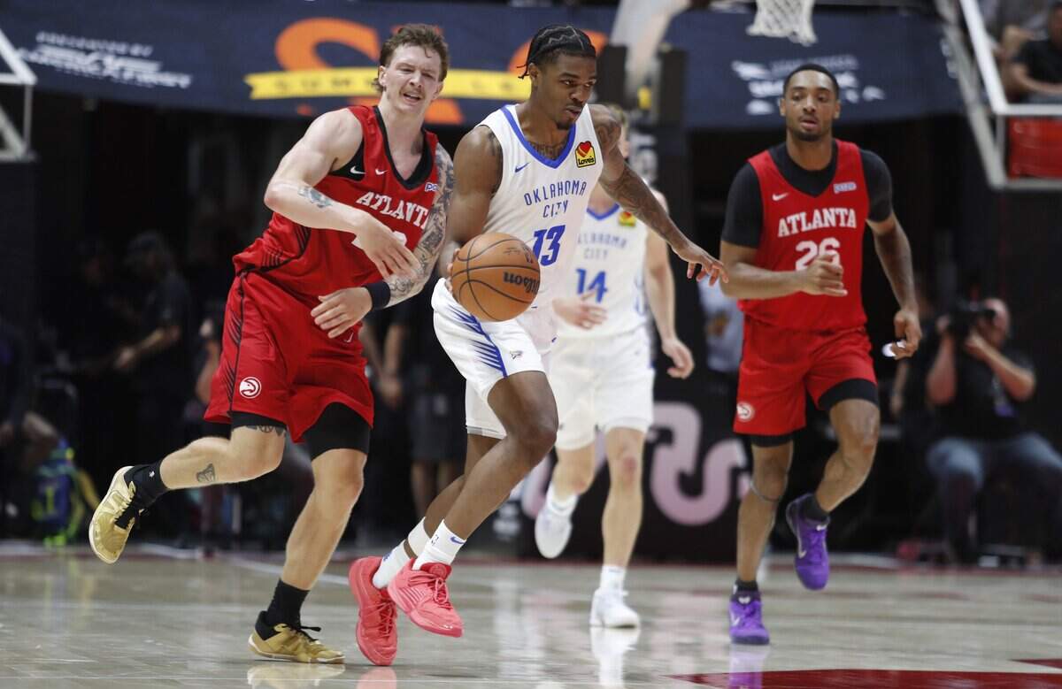 SALT LAKE CITY, UT - JULY 6:  Otega Oweh #13 of the Oklahoma City Thunder brings the ball up the court against Gabe Madsen #33 of the Atlanta Hawks during the second half of their 2026 NBA Salt Lake City Summer League game at the Jon M Huntsman Center on July 6, 2026 in Salt Lake City, Utah.   NOTE TO USER: User expressly acknowledges and agrees that, by downloading and or using this photograph, User is consenting to the terms and conditions of the Getty Images License Agreement. ( Photo by Chris Gardner/ Getty Images)