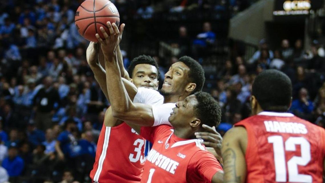 Kentucky Wildcats forward Marcus Lee (00) grabbed an offensive rebound in traffic as Kentucky played Ohio State on Saturday December 19, 2015 in Brooklyn, N.Y.